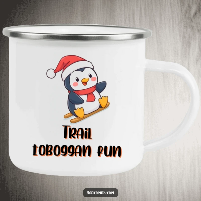 Funny Camping Mug: A penguin in a Santa hat, sliding down a snowy hill, designed for outdoor holiday enthusiasts.