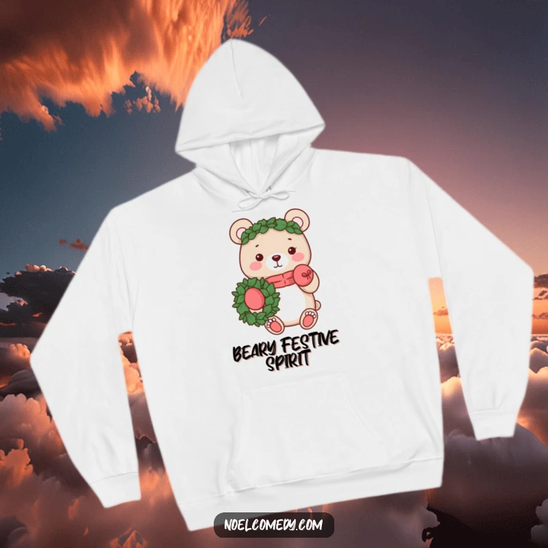 Funny hoodie featuring a cheerful bear wearing mittens and holding a festive wreath. Cozy and holiday-themed.