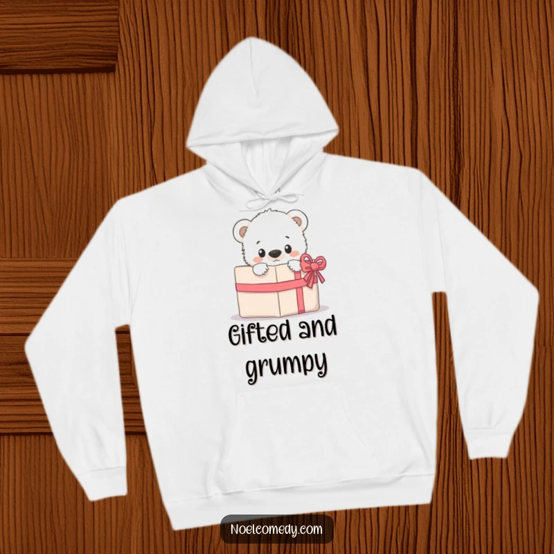 Funny Hoodie: A cuddly polar bear cub peeking adorably from behind holiday gifts, exuding warmth and curiosity.