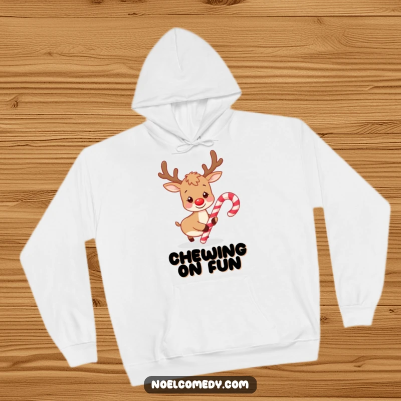 Funny hoodie design featuring a cheerful reindeer playfully nudging a candy cane with its nose, perfect for staying warm and festive.