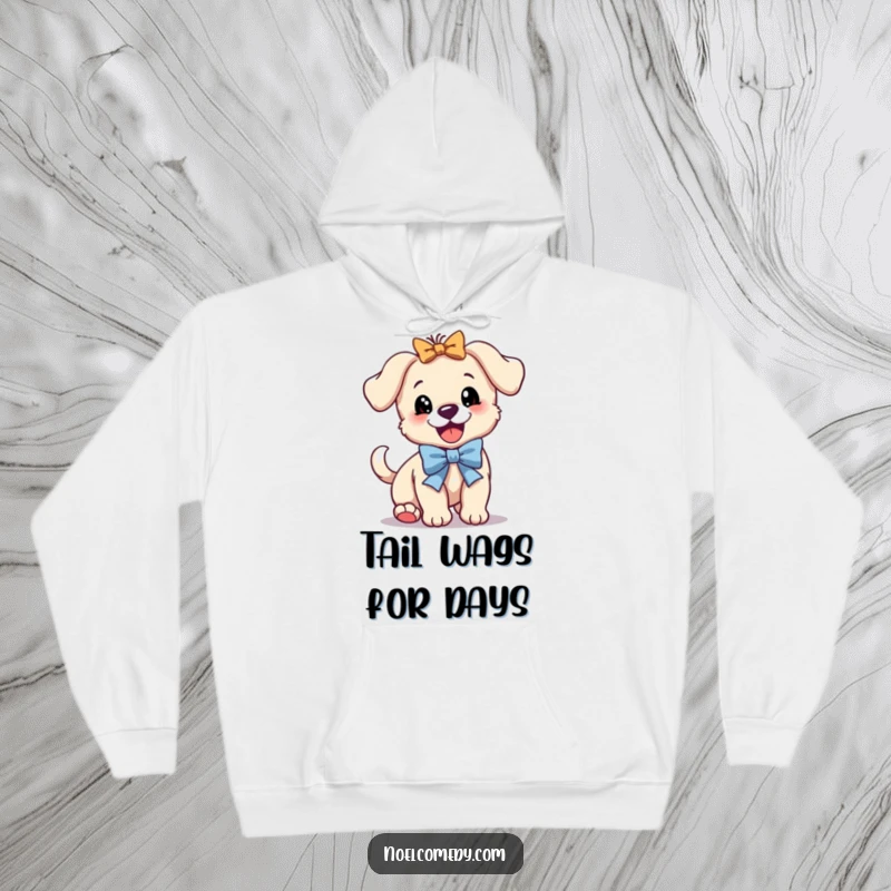 Funny hoodie design of a puppy with a festive bow, bouncing and wagging its tail furiously, radiating happiness.