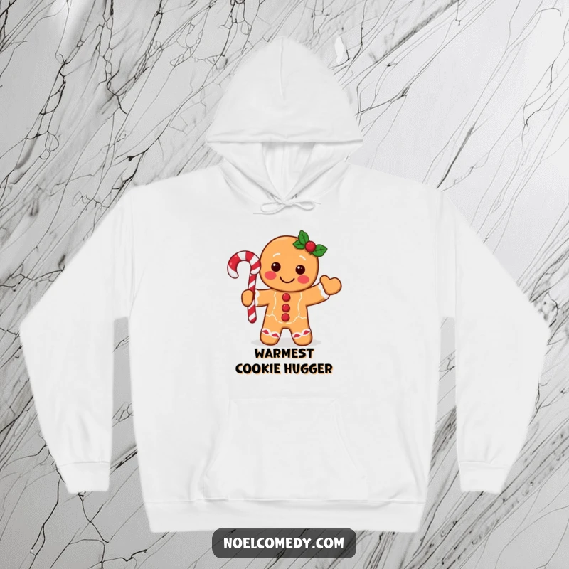 Funny gingerbread man hoodie showing a happy character waving a candy cane, ideal for cozying up during winter holidays.