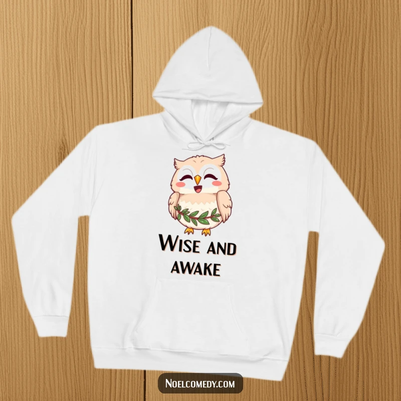 Funny hoodie depicting a joyful owl with a wreath around its neck, hooting merrily, perfect for cozy and wise moments.