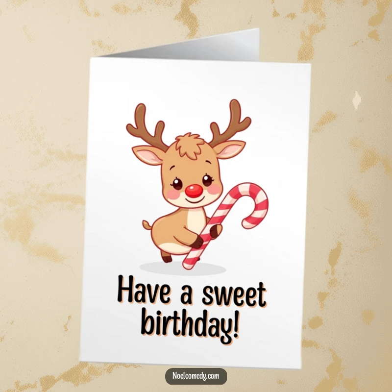 Funny Free Printable Birthday Card featuring a playful reindeer gently nudging a candy cane with its nose.