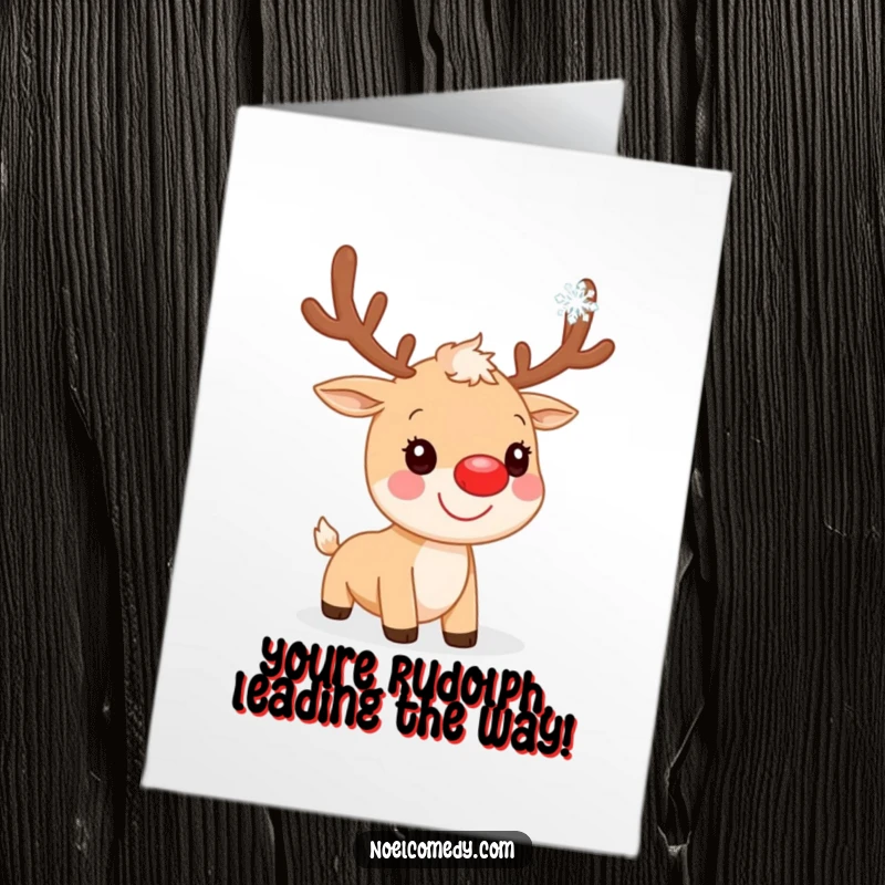 Free Printable Congratulations Card: A smiling reindeer with a red nose catching a snowflake, celebrating good news.