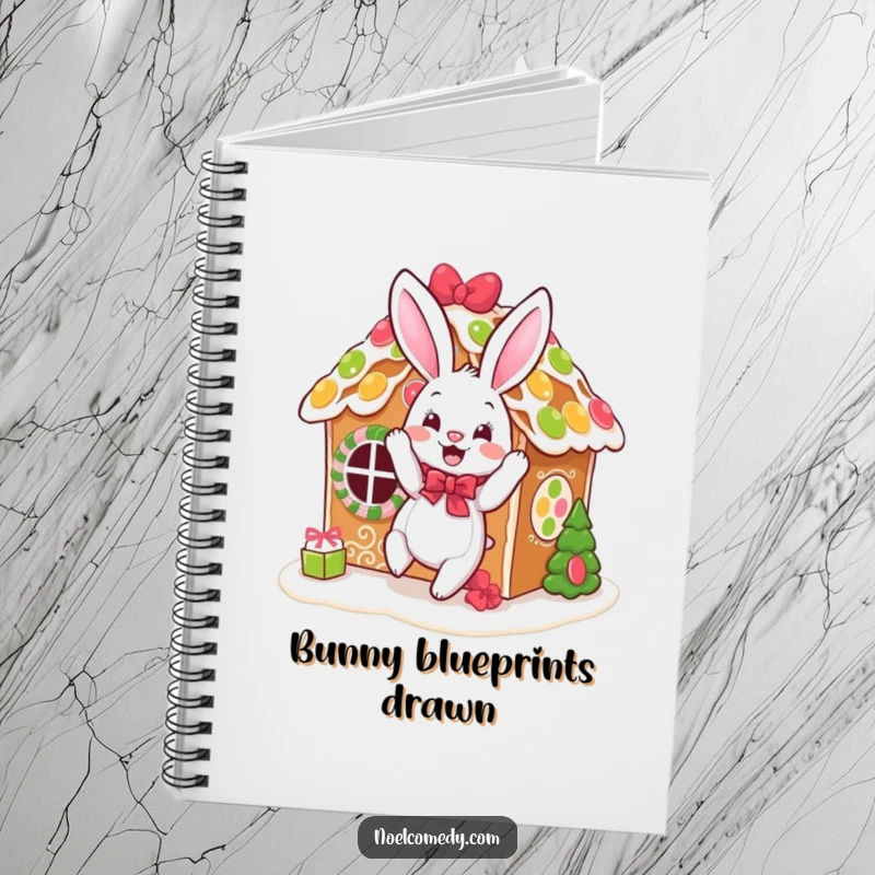 Funny notebook cover featuring a bouncing bunny decorating a gingerbread house, inspiring festive note-taking.