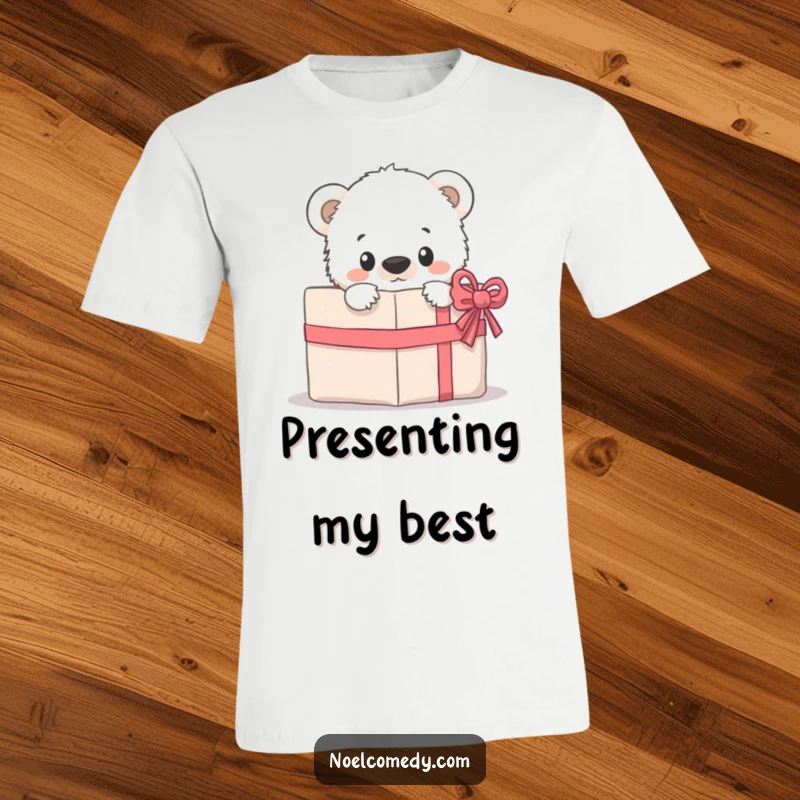 Funny T-Shirt: A curious polar bear cub peeking mischievously from behind a festive wrapped present, ready for discovery.