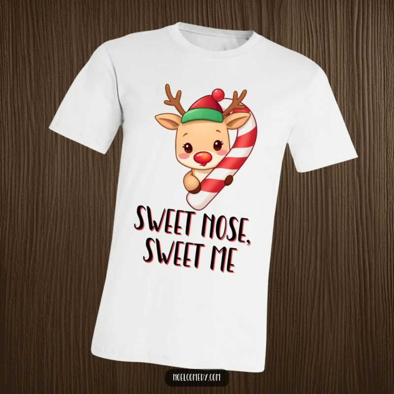 Funny cute reindeer with a glowing red nose, peeking from around a giant candy cane, printed on a festive t-shirt.