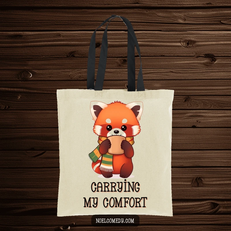 Funny Tote Bag: A red panda in a festive scarf holds a warm mug, offering a humorous and practical accessory for everyday use.