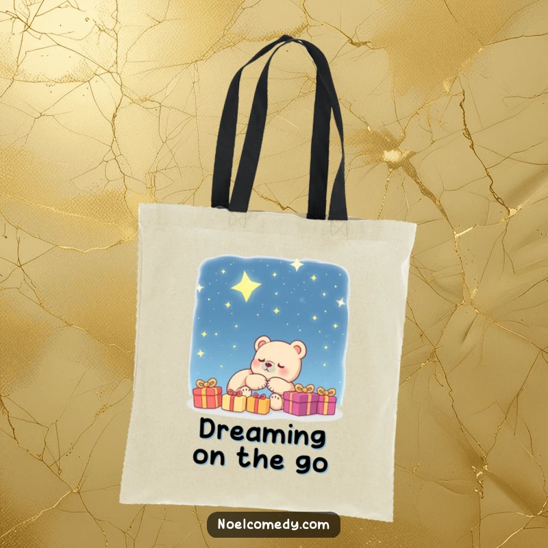 Funny Tote Bag: A bear cub sleeps soundly, dreaming of presents beneath a starry night sky, perfect for carrying treasures.